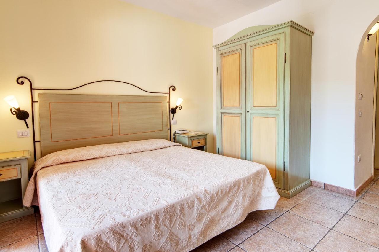 Hotel Li Graniti Байя Сардиния Экстерьер фото